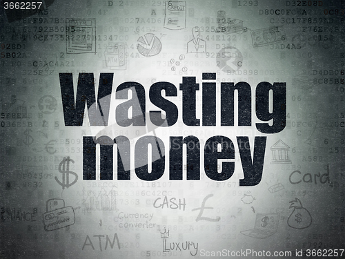 Image of Money concept: Wasting Money on Digital Paper background
