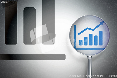 Image of Business concept:  Growth Graph with optical glass on digital background