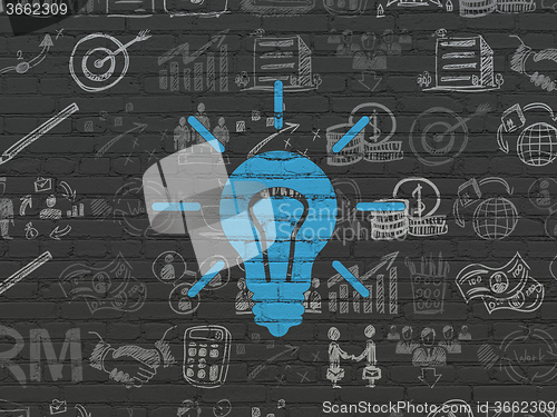 Image of Finance concept: Light Bulb on wall background