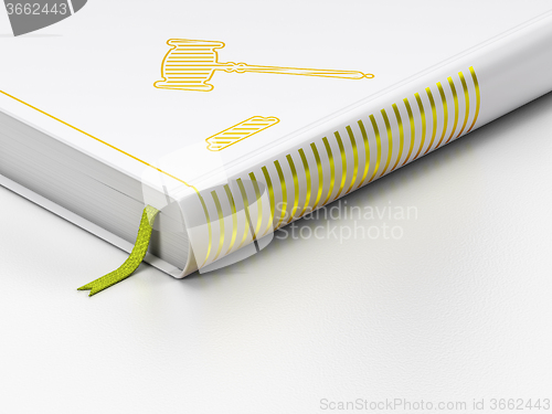 Image of Law concept: closed book, Gavel on white background