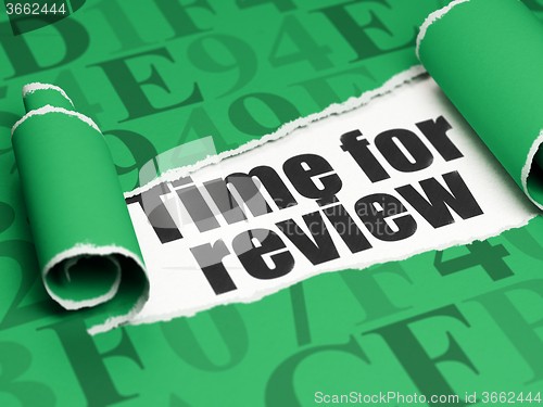 Image of Timeline concept: black text Time for Review under the piece of  torn paper