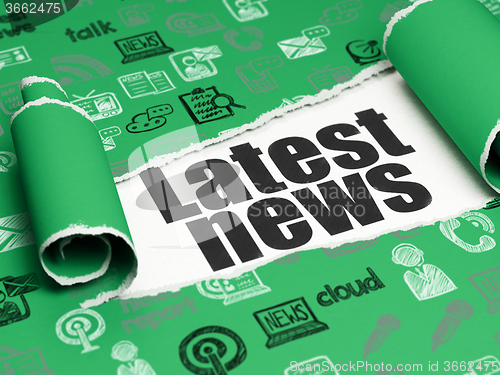 Image of News concept: black text Latest News under the piece of  torn paper
