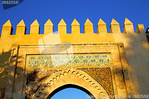 Image of morocco arch in old construction street   sky