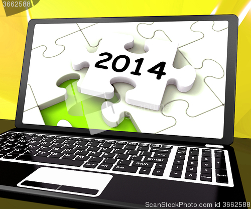 Image of Two Thousand And Fourteen On Laptop Shows New Years Resolution 2