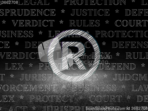 Image of Law concept: Registered in grunge dark room