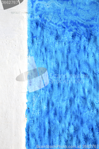 Image of blue  in texture wall  