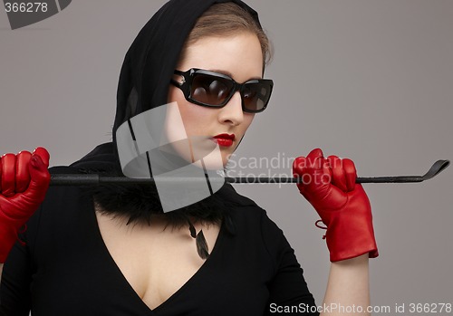 Image of lady in red gloves with crop #2