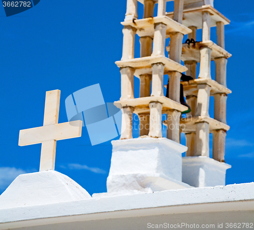 Image of in cyclades      europe greece a cross the cloudy sky and bell