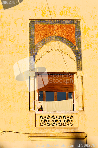 Image of   yellow  in morocco africa old construction 