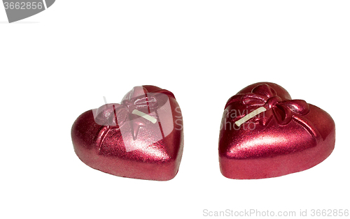 Image of Two candles of the original form on a white background.