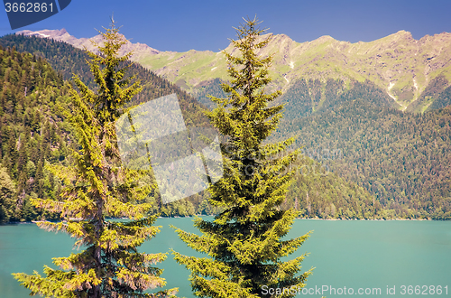 Image of A picturesque lake surrounded by high mountains.