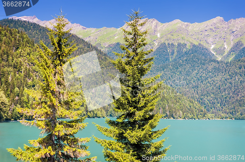 Image of A picturesque lake surrounded by high mountains.