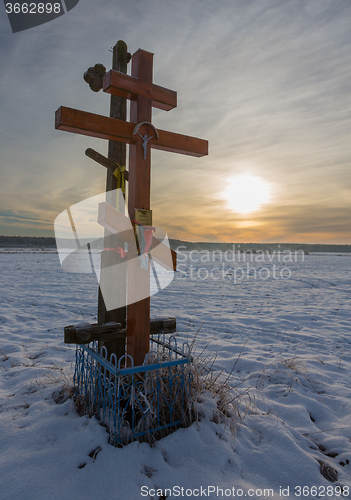 Image of Orthodox church crosses in sunset