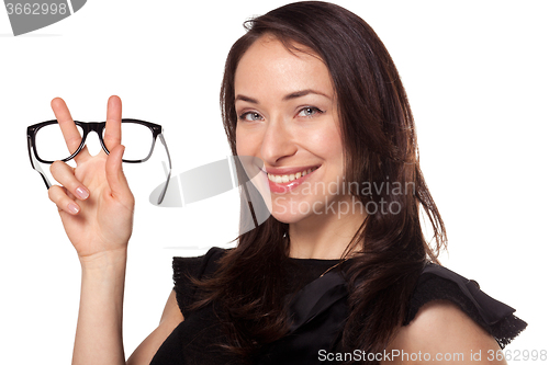 Image of Happy woman with a new glasses at optics