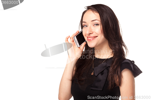 Image of Young happy woman calling using mobile phone