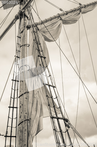 Image of Mast and sailboat rigging, toning