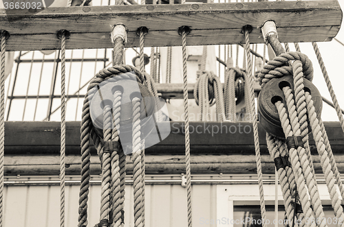 Image of Blocks and rigging of an old sailboat