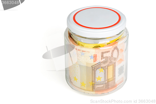 Image of Money in the jar isolated on white background