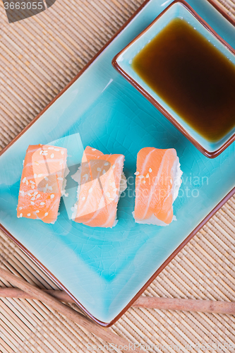 Image of Top view to california maki sushi with salmon