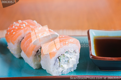 Image of California maki sushi with fish 