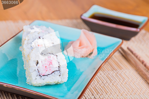 Image of California maki sushi with crab meat on plate