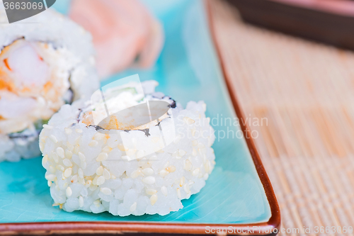 Image of California maki sushi with tempura shrimp