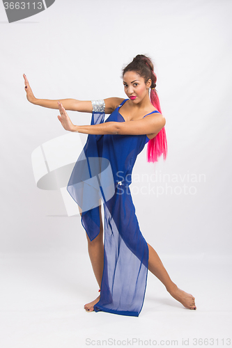 Image of Beautiful dancer performs a dance elements