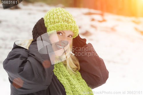 Image of Attractive Woman Having Fun in the Snow