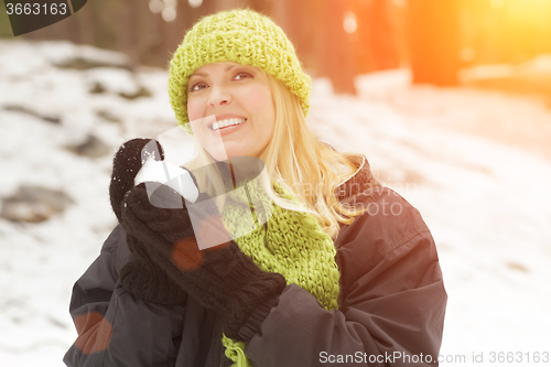 Image of Attractive Woman Having Fun in the Snow