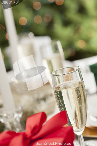Image of Christmas Gift with Place Setting at Table