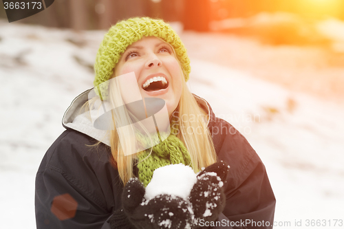 Image of Attractive Woman Having Fun in the Snow