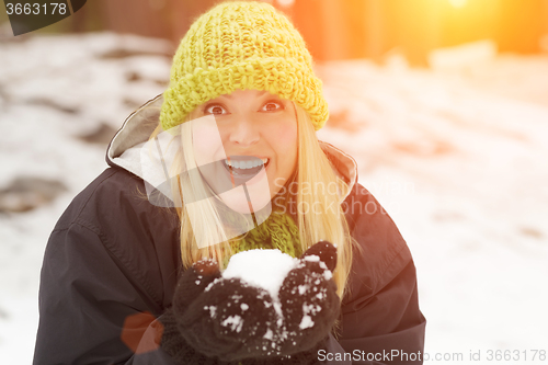 Image of Attractive Woman Having Fun in the Snow