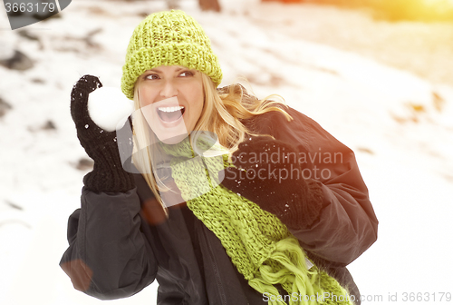 Image of Attractive Woman Having Fun in the Snow