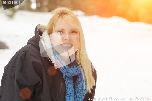 Image of Attractive Woman Having Fun in the Snow
