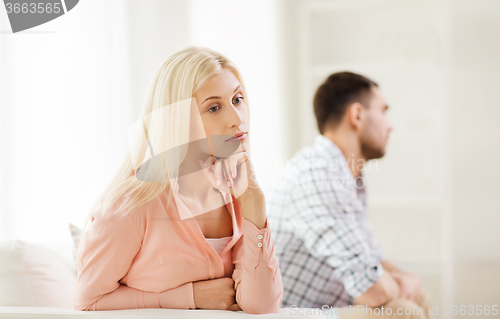 Image of unhappy couple having argument at home