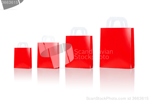 Image of many blank red shopping bags