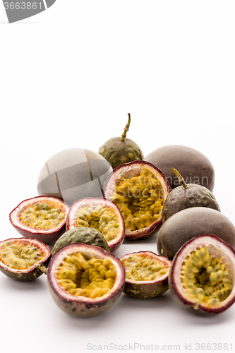 Image of Sour Passion Fruit Pulp In Its Purple Rind