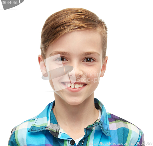 Image of smiling boy in checkered shirt
