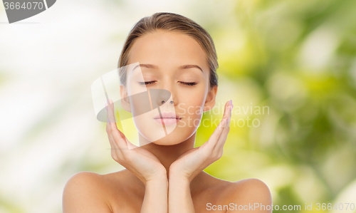 Image of young woman face and hands
