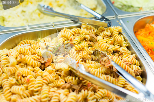 Image of close up of pasta and dishes on catering tray