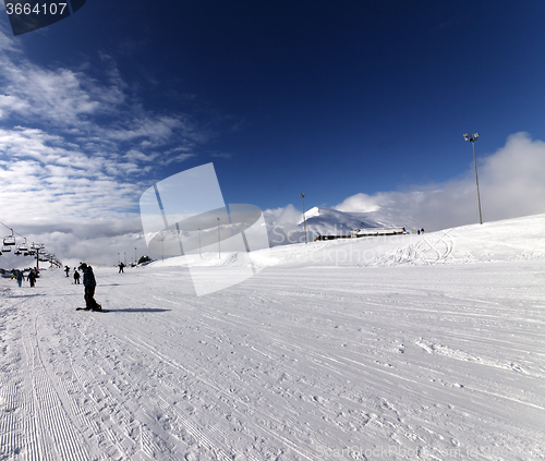 Image of Ski slope at sun wind day