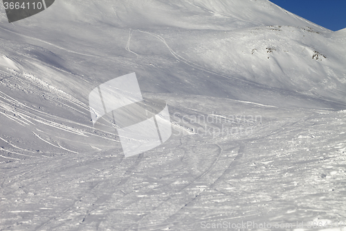 Image of Snowy skiing piste