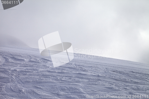 Image of Ski slope for slalom and overcast sky in bad weather