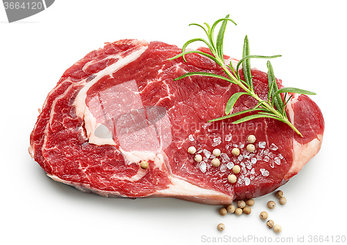Image of fresh raw beef steak with spices