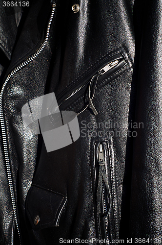 Image of close up of traditional black classic leather motorcycle jacket