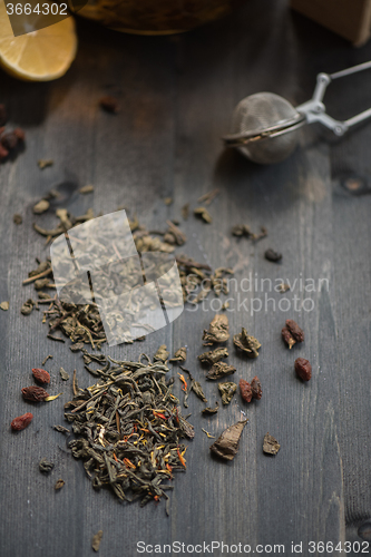 Image of berries  tea composition