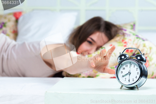 Image of The young girl in bed