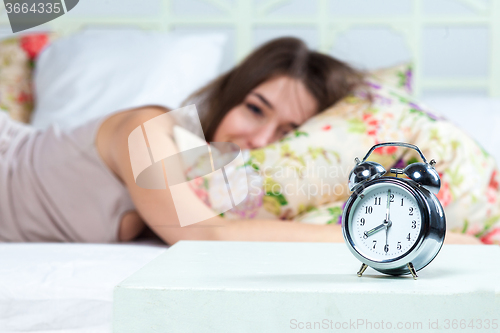 Image of The young girl in bed