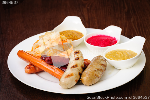 Image of german sausages with cabbage