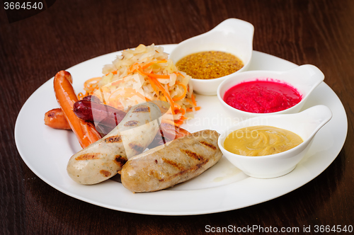 Image of german sausages with cabbage